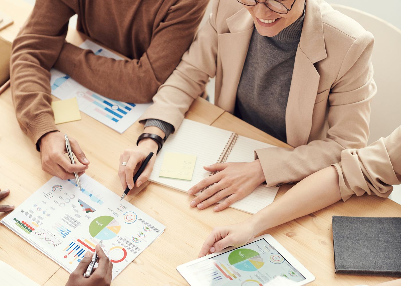 Analysts reviewing financial data and reports together